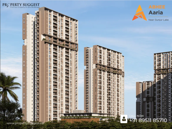 Aerial view of Abhee Aaria residential towers in Gunjur, Varthur Road, Bangalore featuring high-rise apartments surrounded by greenery and a developed by Abhee Ventures.