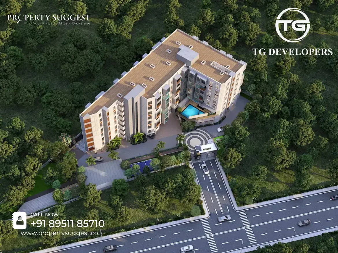Aerial view of TG AURA residential project in Thindlu Road, Sarjapura, Bangalore featuring low rise apartments surrounded by greenery and a developed by TG Developers (TG Prime Realty Private Limited).